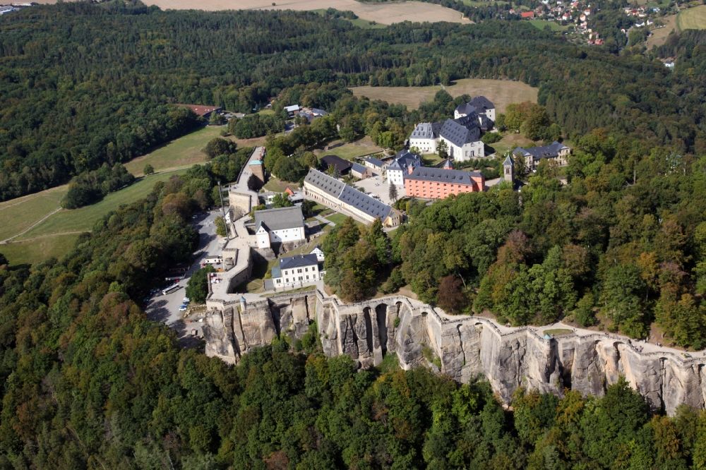 Aerial image Königstein - The Fortress Koenigstein at the river Elbe in the county district of Saxon Switzerland East Erzgebirge in the state of Saxony. The fortress is one of the largest mountain fortresses in Europe and is located amidst the Elbe sand stone mountains on the flat top mountain of the same name