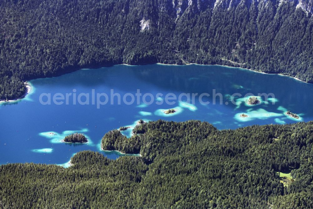 Grainau from above - The islands of Almbichl, Scheibeinsel, Xudwigsinsel, Maximiliansinsel, Schoenbichl, Braxeninsel and Sasseninsel in the Eibsee near Garmisch-Partenkirchen in the state of Bavaria. The lake is considered one of the most beautiful lakes in the Bavarian Alps due to its clear, green-tinted water