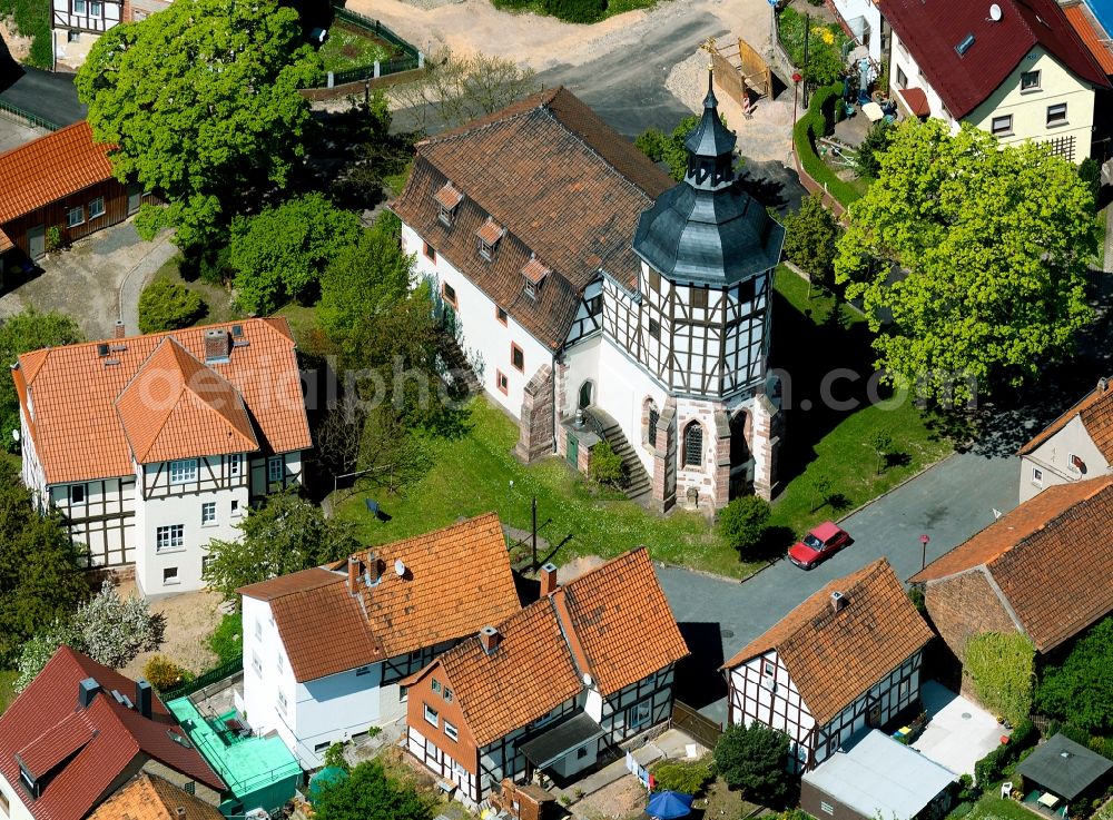 Aerial photograph Gerstungen - St. Catherine's Church is the church of the Lutheran congregation in Gerstungen in the Wartburg-Stiftung Eisenach district in Thuringia. It stands on the high banks of the Werra River immediately adjacent to the former water castle. The architectural ensemble is a landmark in this community westthüringischen. First documented alterations were made in 1588, they were caused by fire, and made the complete new construction of the nave is required