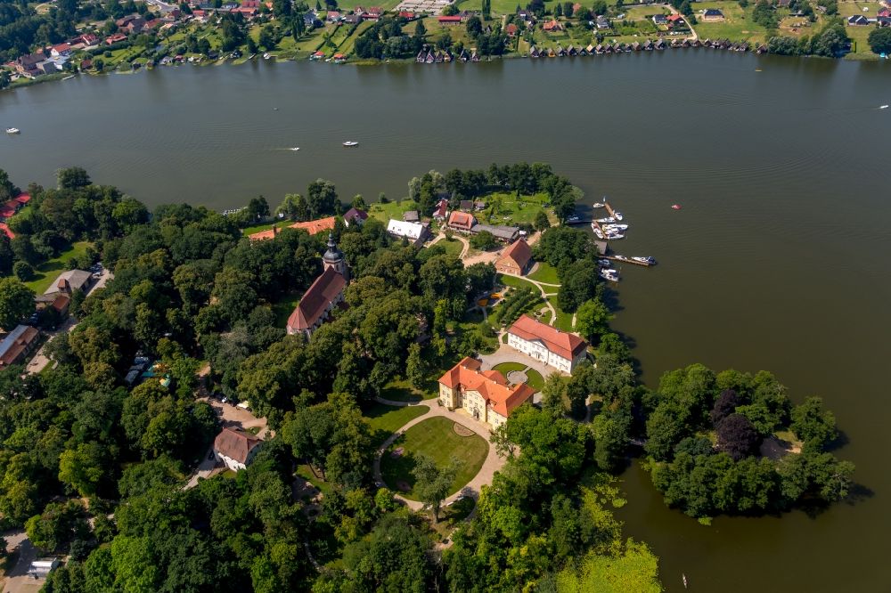 Mirow from above - The Mirow Castle island with its ensemble of buildings of the castle Mirow, the cavalier house and the St. John church on Lake Mirow in Mirow in Mecklenburg-Vorpommern