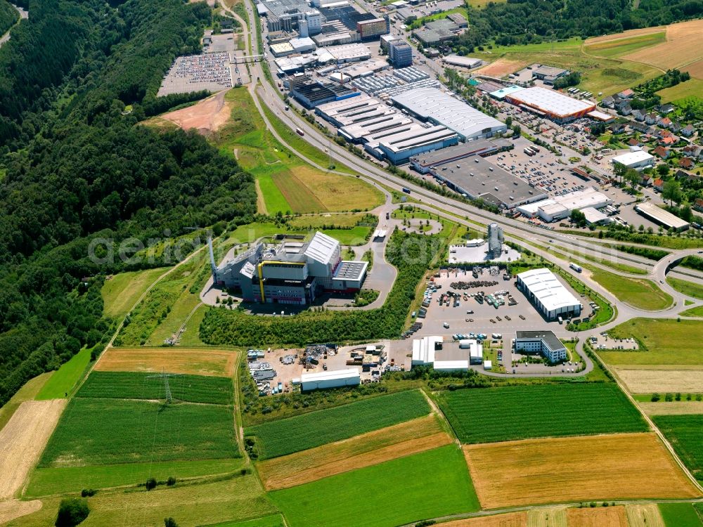 Pirmasens from above - The waste management facilities in the Fehrbach part of Pirmasens in the state of Rhineland-Palatinate. The waste fuelled power station is run by Eon Energy from Waste and is in use since 1999. The facility is in close vicinity of the industrial and commerce area Fehrbach as well as the county highway 10. Fields and acres of the local agriculture are adjacent