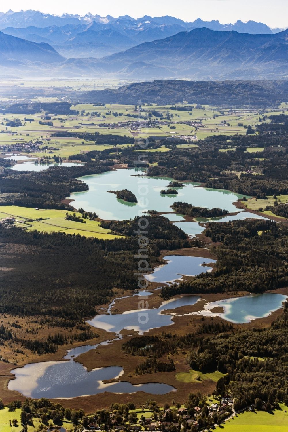 Seeshaupt from the bird's eye view: Waterfront landscape on the Osterseen lakes in Iffeldorf in the state Bavaria, Germany