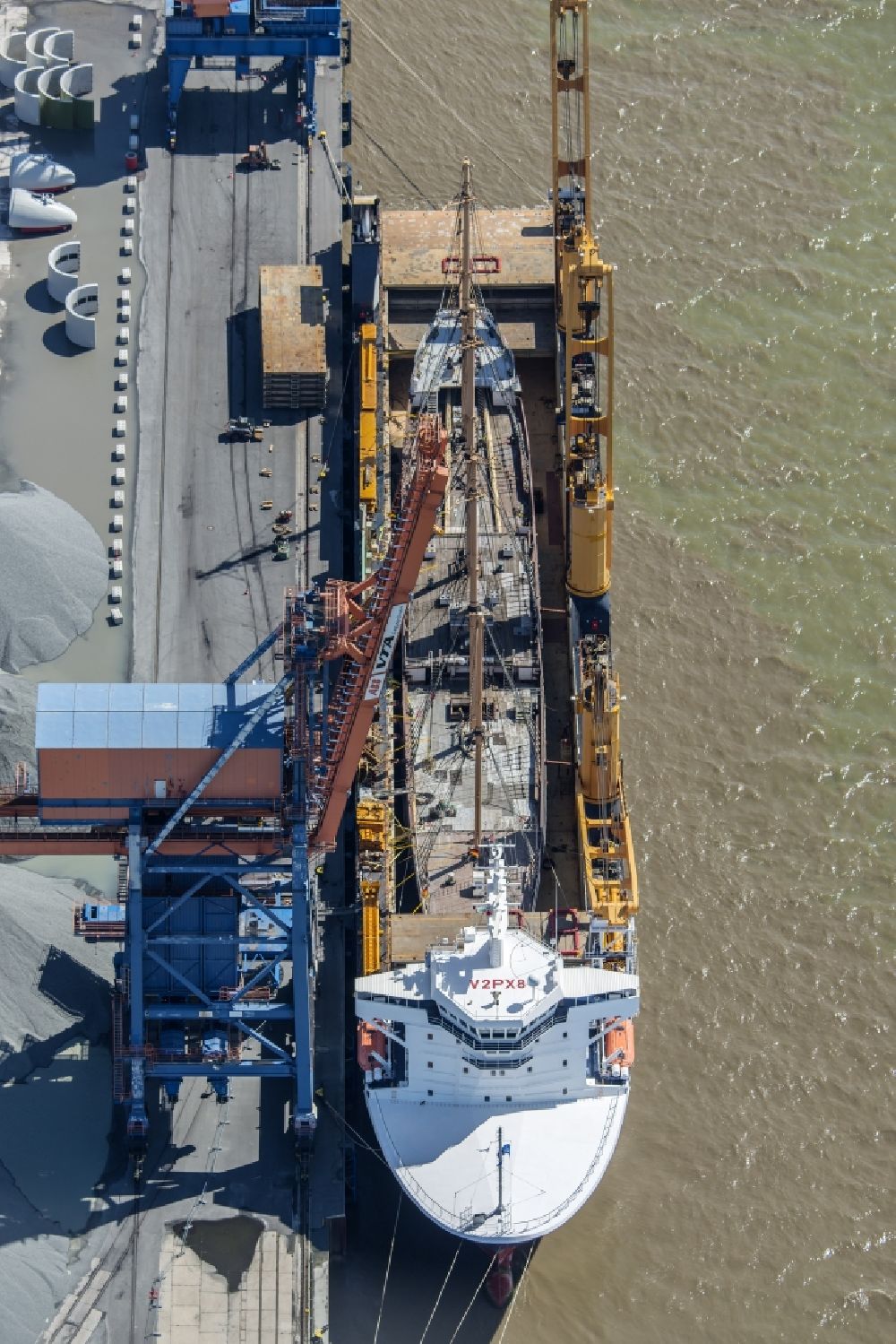 Aerial image Brunsbüttel - The Peking is a four-mast steel barge in Brunsbuettel in the transport vessel Combilift ship Combi Dock 3 at the harbor quay in the state Schleswig-Holstein, Germany