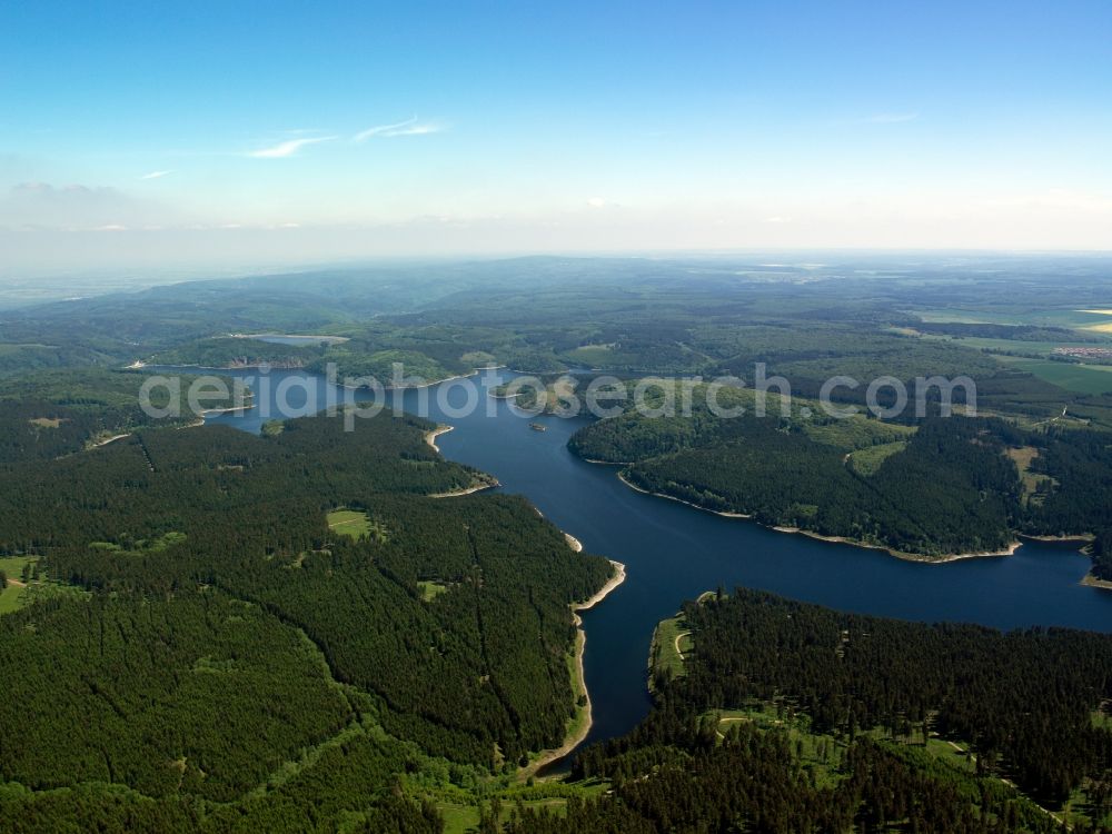 Oberharz am Brocken from above - The Rappbode Valley Barrier and barrier lake in the county district of Harz in the state of Saxony-Anhalt. The valley lock consists of a water works, water power plants and barrier lake. The main dam is the highest in Germany and blocks the rivers Rappbode and Hassel. Various smaller pools and valley locks create the water barrage system of Rappbode. Visible are the various locks and dams as well as the surrounding forest of Ostharz