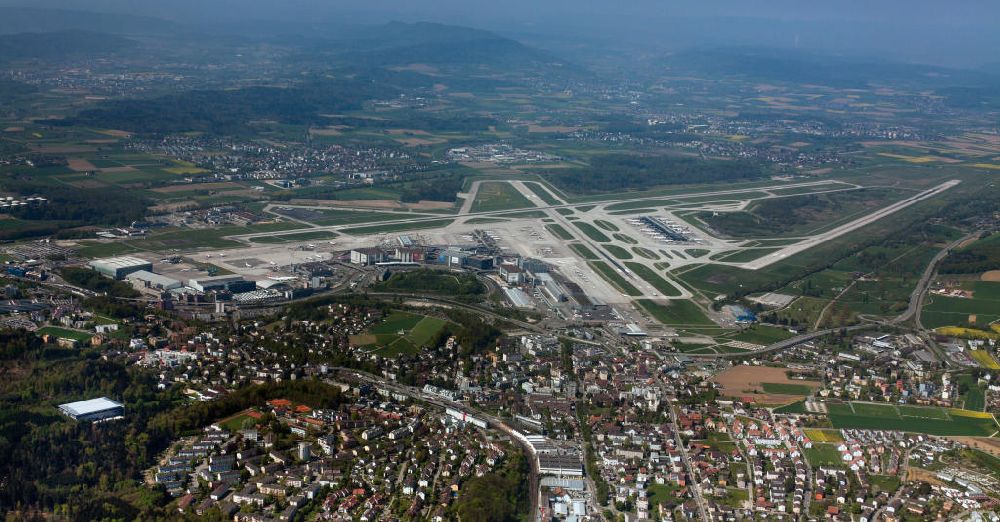 Zürich from the bird's eye view: View at the airfield; starting and landing runways of Zürich airport, which was opened in 1948