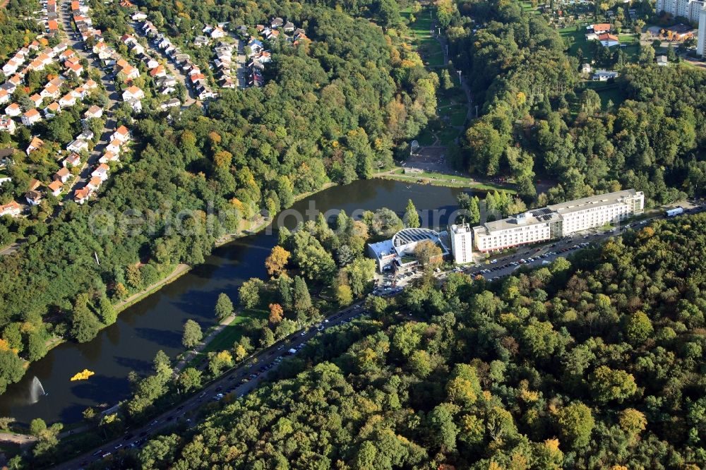 Saarbrücken from above - The casino in Saarbrücken in the state of Saarland. The compound is located between the German-French garden, a recreational area, and the river Pulverbach. It is one of three casinos in the city and is used for other events as well