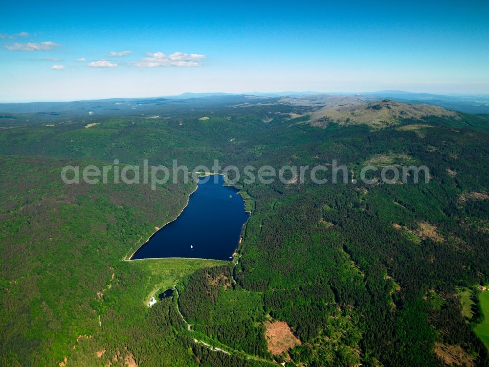 Aerial photograph Frauenau - The barrage Frauenau in the state of Bavaria. The barrier lake is located in the Bavarian Forest near Frauenau and was completed in 1983 to guarantee the provision of drinking water for the region. The landscape with its hills is visible here as well. The dam is located on the western end of the lake and is over 70m high