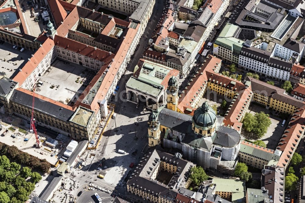Aerial image München - The Catholic Church of St. Cajetan called Theatinerkirche, was court-order and at the same time the church Theatines. It is the first in the style of the late Italian Baroque church, built in the region and is today the architectural ensemble of the Odeon Square. On 11 June 1675 the church was consecrated, it was at that time still unfinished state. During the Second World War, particularly in the years 1944/45, the church was badly damaged. Already in 1946 the reconstruction began, which was largely completed in 1955. Since 1954, care of the Dominican church