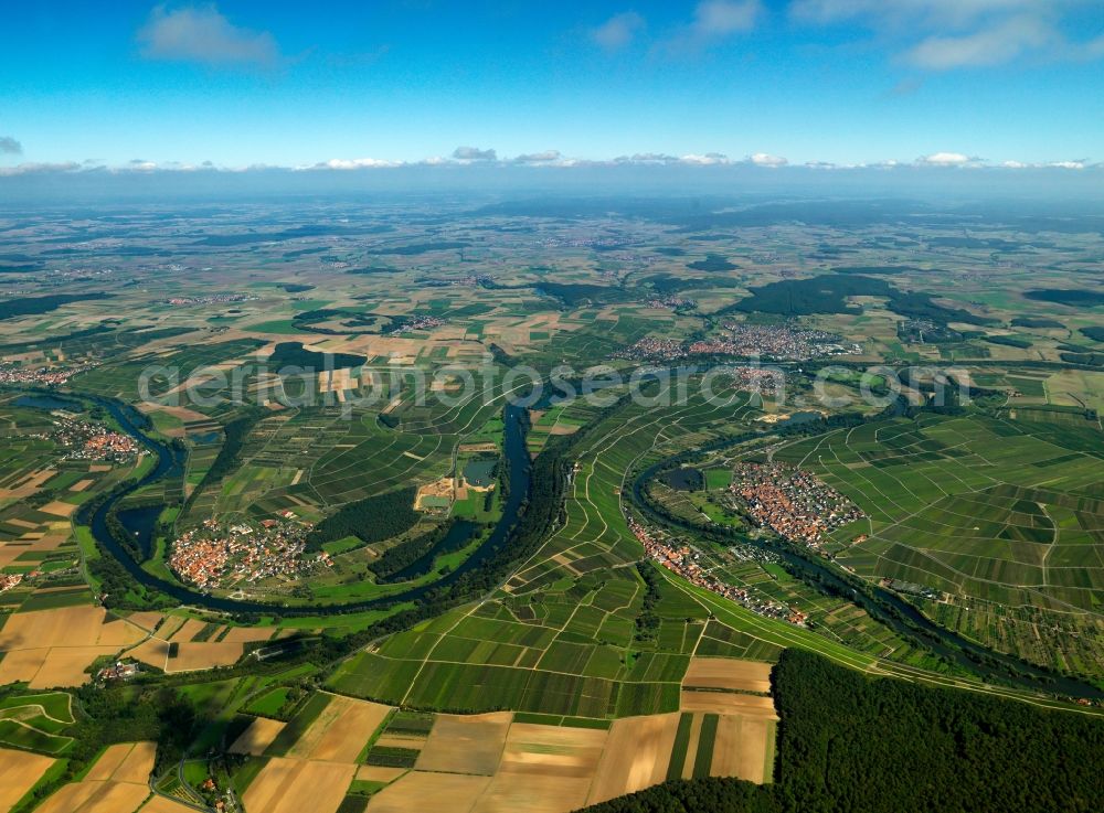 Volkach from above - The horseshoe bend of the river Main in the Escherndorf part of the city of Volkach in the state of Bavaria. The river runs through the landscape and encloses Escherndorf. The run of the river can be traced through the overview. The horseshoe bend is nature preserve area