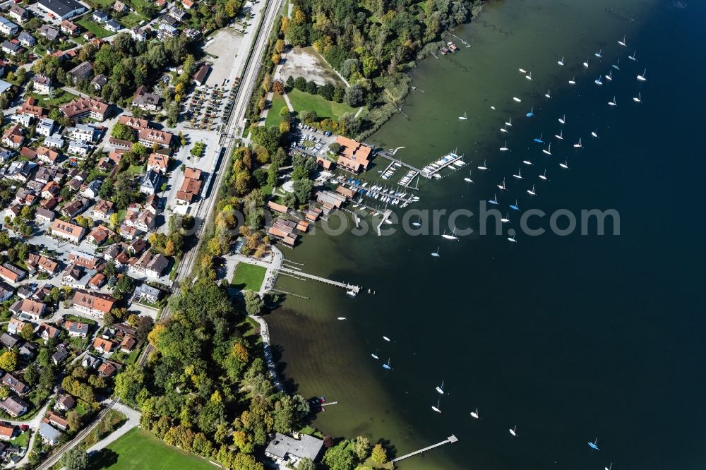 Dießen am Ammersee from above - Pleasure boat marina with docks and moorings on the shore area in Diessen am Ammersee in the state Bavaria, Germany