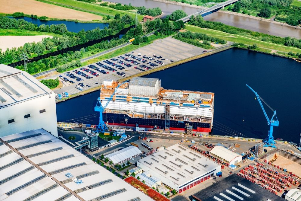 Papenburg from above - Cruise ship Disney Wish on the shipyard of the Meyer Werft in Papenburg in the state Lower Saxony, Germany