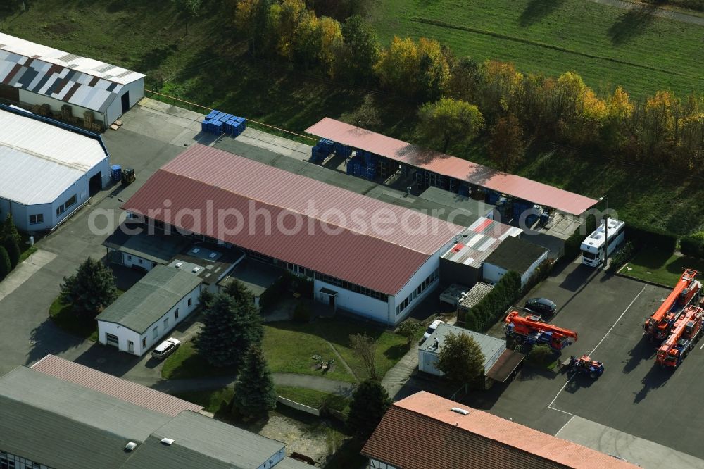 Sülzetal from the bird's eye view: Building and production halls on the premises of DKM Dodendorfer Kunststoff- and Metalltechnik GmbH Am Bahnhof in the district Dodendorf in Suelzetal in the state Saxony-Anhalt, Germany