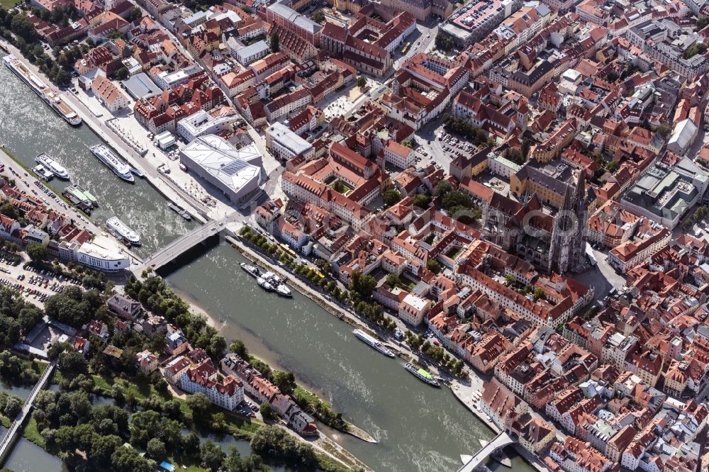 Aerial image Regensburg - Cathedral of St Peter and Stone Bridge in Old Town- center downtown Regensburg on the Danube in the state Bavaria. The church of the diocese Regensburg's most important cathedral. The medieval stone bridge is the other landmark of the city Regensburg. It connects the town with the district Stadtamhof