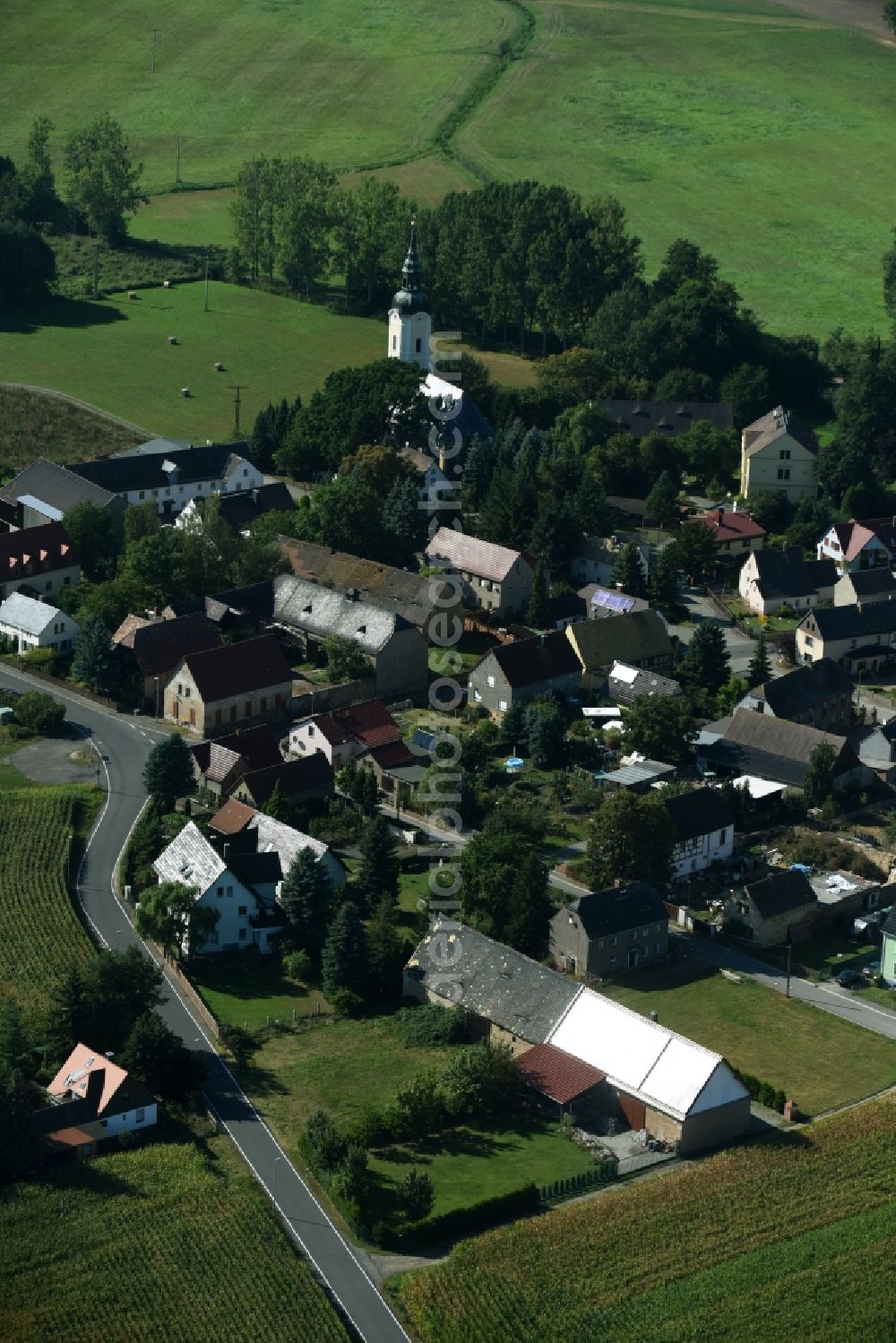 Müglenz from the bird's eye view: View of the village of Mueglenz in the state of Saxony. The village church is located on the Western edge of the village