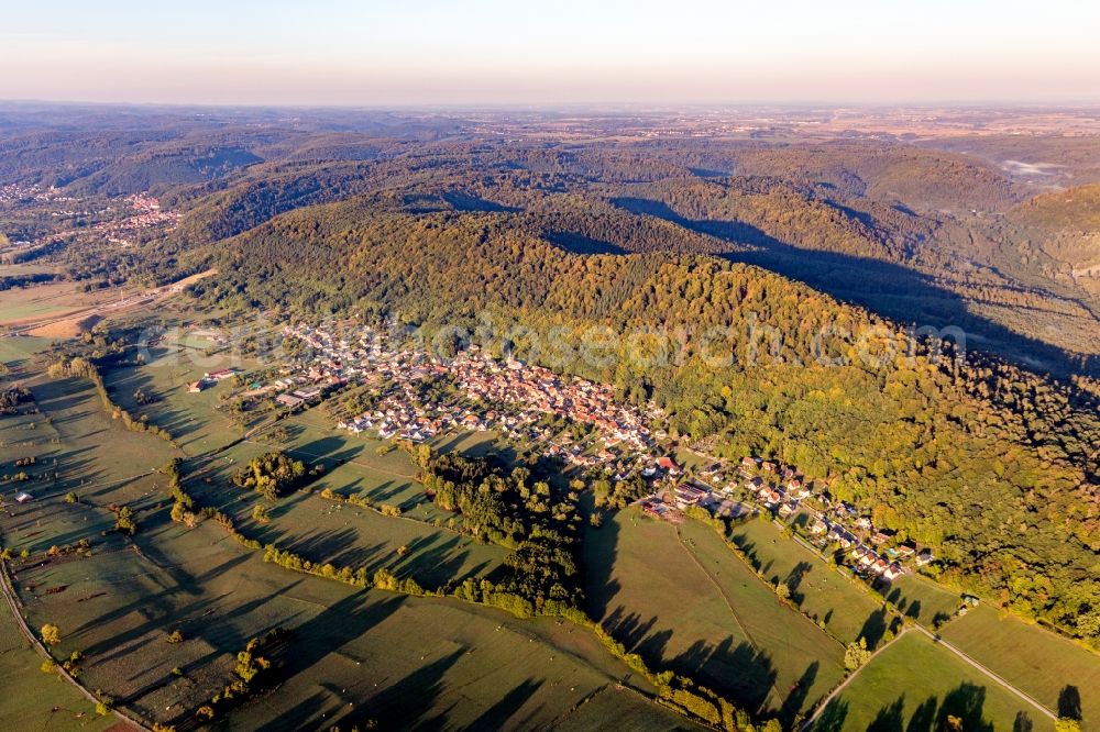 Aerial image Ernolsheim-les-Saverne - Village - view on the edge of agricultural fields and farmland in Ernolsheim-les-Saverne in Grand Est, France