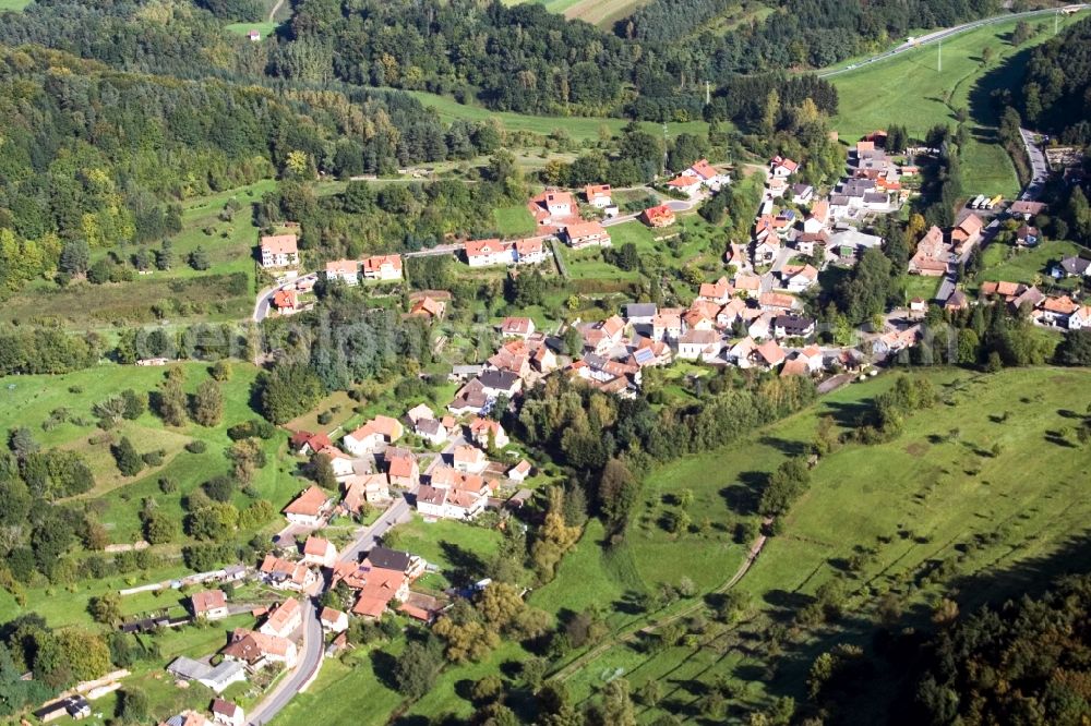 Erlenbach bei Dahn from above - Village - view on the edge of agricultural fields and farmland in Erlenbach bei Dahn in the state Rhineland-Palatinate