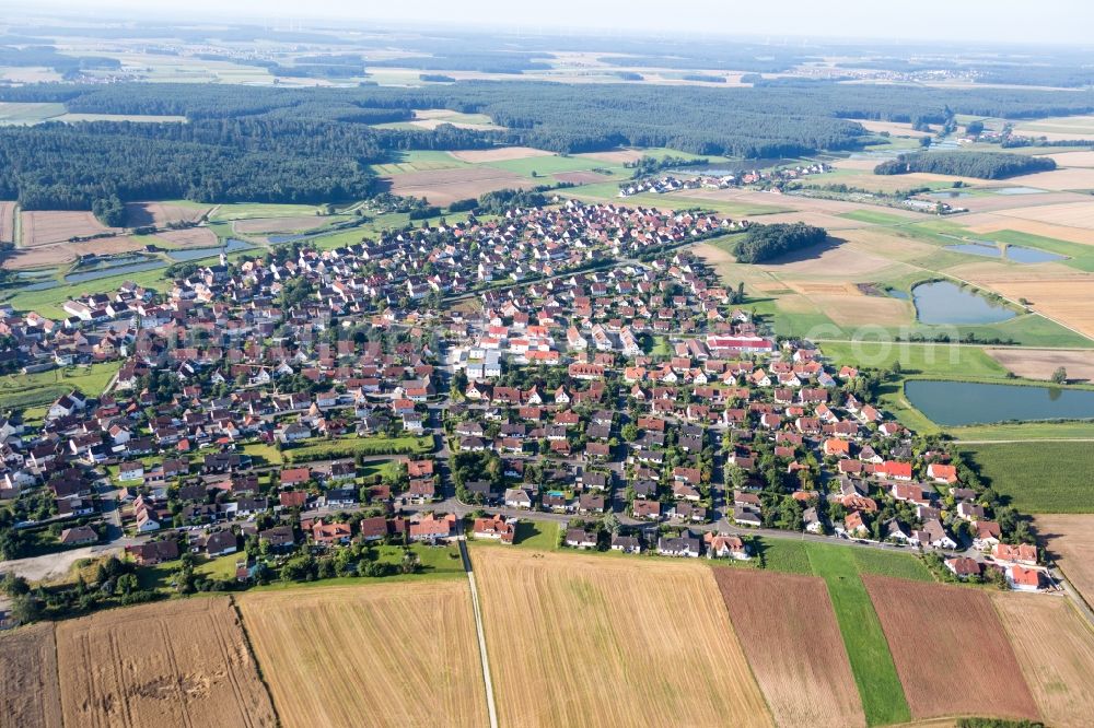Aerial image Weisendorf - Village - view on the edge of agricultural fields and carp lakes in Weisendorf in the state Bavaria, Germany