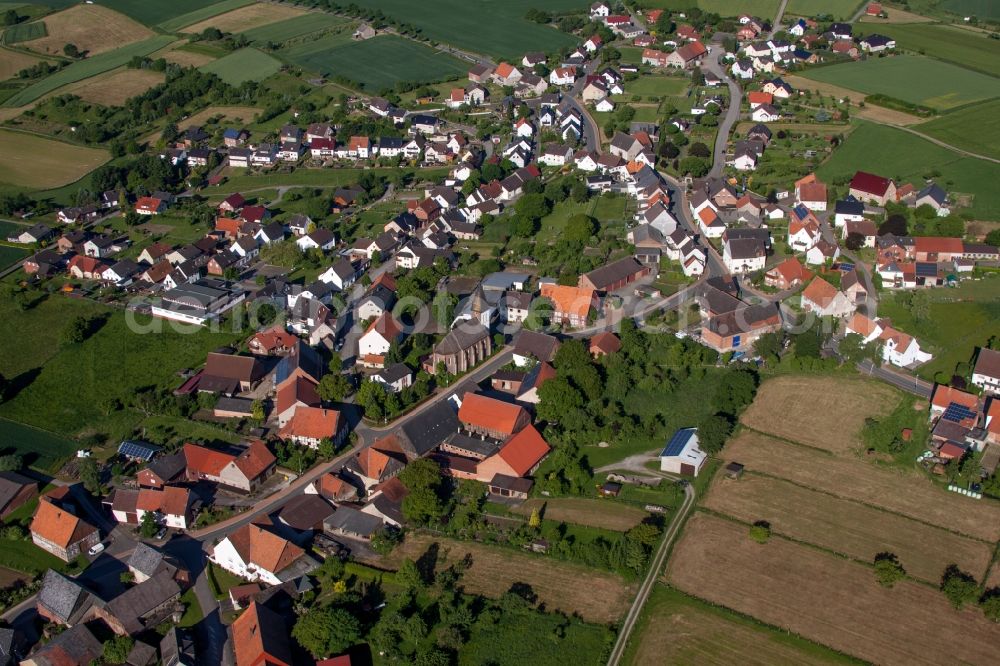 Aerial image Beverungen - Village - view on the edge of agricultural fields and farmland in the district Haarbrueck in Beverungen in the state North Rhine-Westphalia, Germany