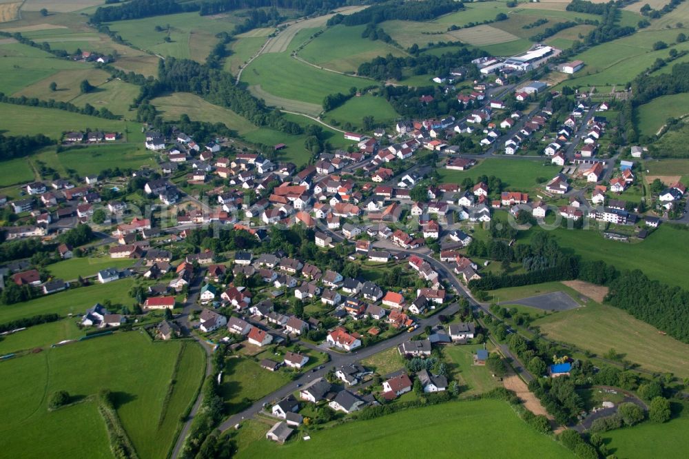 Neuhof from above - Village - view on the edge of agricultural fields and farmland in the district Hauswurz in Neuhof in the state Hesse, Germany