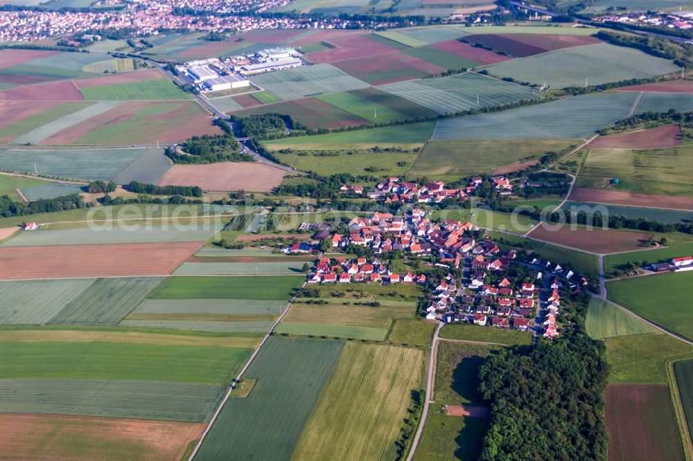 Aerial photograph Estenfeld - Village - view on the edge of agricultural fields and farmland in the district Muehlhausen in Estenfeld in the state Bavaria, Germany