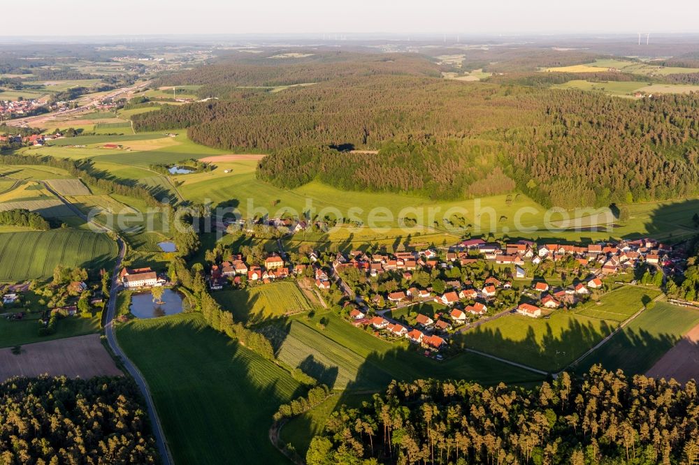 Geiselwind from the bird's eye view: Village - view on the edge of agricultural fields and farmland in the district Rehweiler in Geiselwind in the state Bavaria, Germany