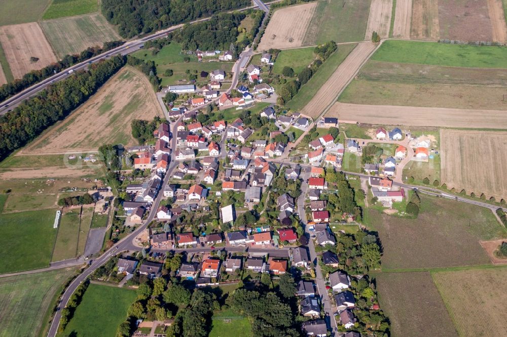 Aerial image Roth - Village - view on the edge of agricultural fields and farmland in Roth in the state Rhineland-Palatinate, Germany