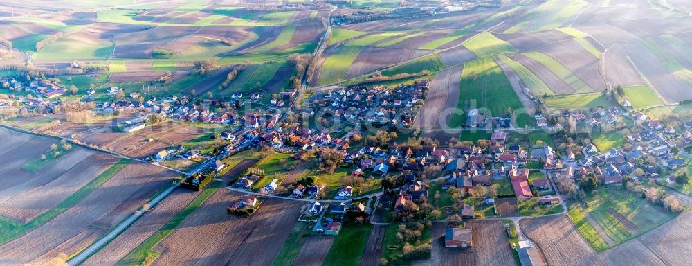 Wintzenbach from above - Village - view on the edge of agricultural fields and farmland in Wintzenbach in Grand Est, France