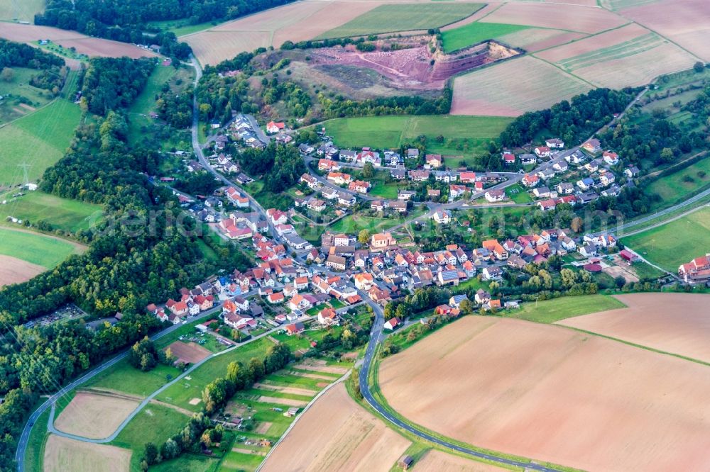 Wüstenzell from the bird's eye view: Village - view on the edge of agricultural fields and farmland in Wuestenzell in the state Bavaria, Germany