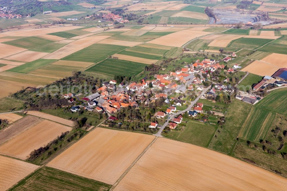 Aerial image Zoebersdorf - Village - view on the edge of agricultural fields and farmland in Zoebersdorf in Grand Est, France