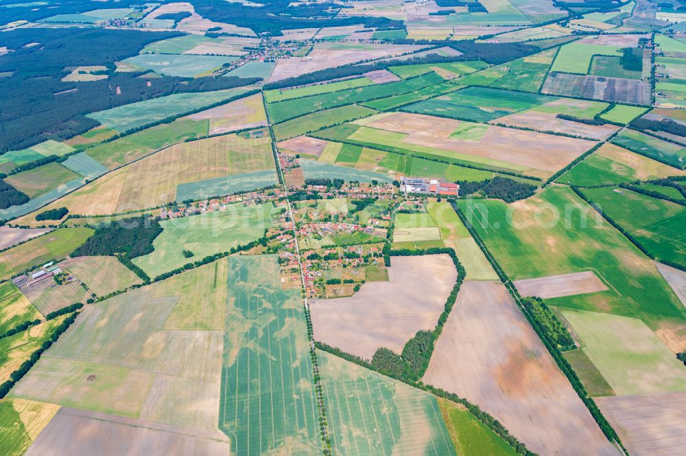 Glaisin from above - Agricultural land and field borders surround the settlement area of the village in Glaisin in the state Mecklenburg - Western Pomerania, Germany
