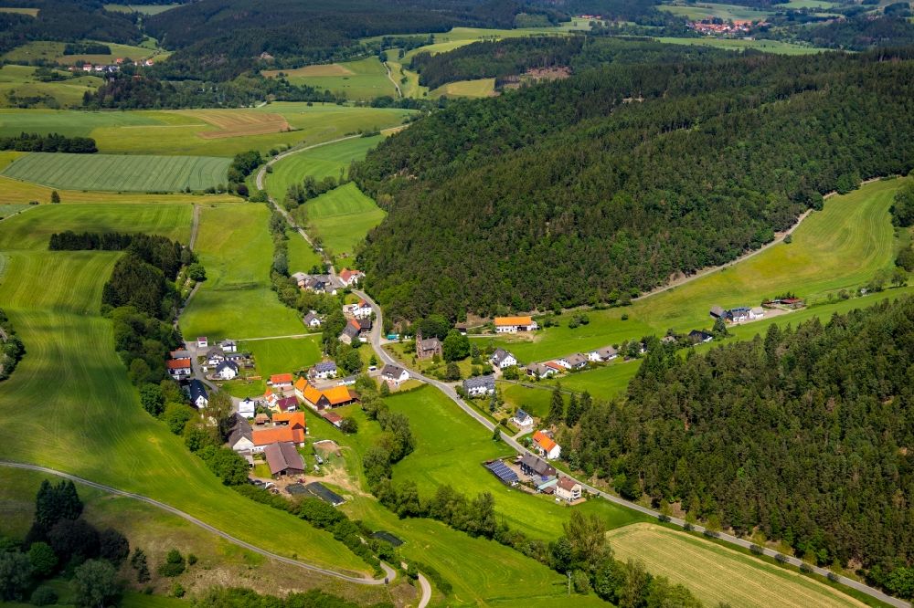 Alleringhausen from above - Village - view on the edge of forested areas in Alleringhausen in the state Hesse, Germany