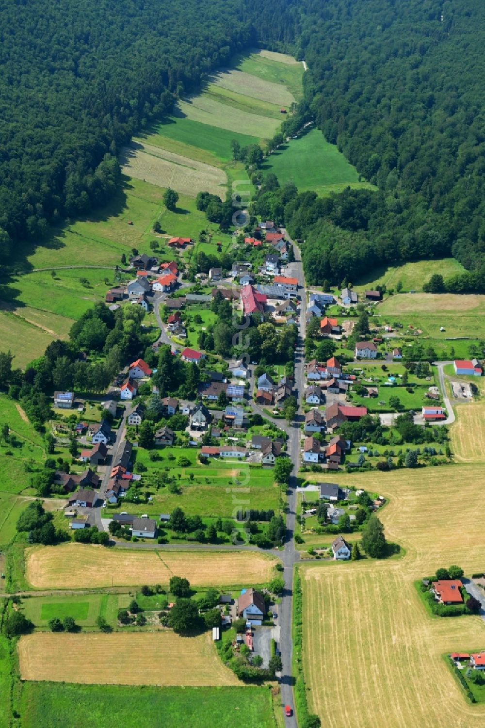 Aerial image Amelith - Village - view on the edge of forested areas in Amelith in the state Lower Saxony, Germany