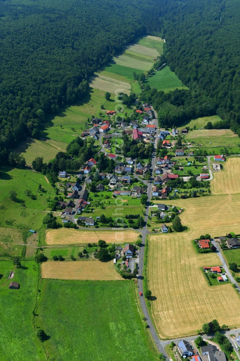 Aerial photograph Amelith - Village - view on the edge of forested areas in Amelith in the state Lower Saxony, Germany