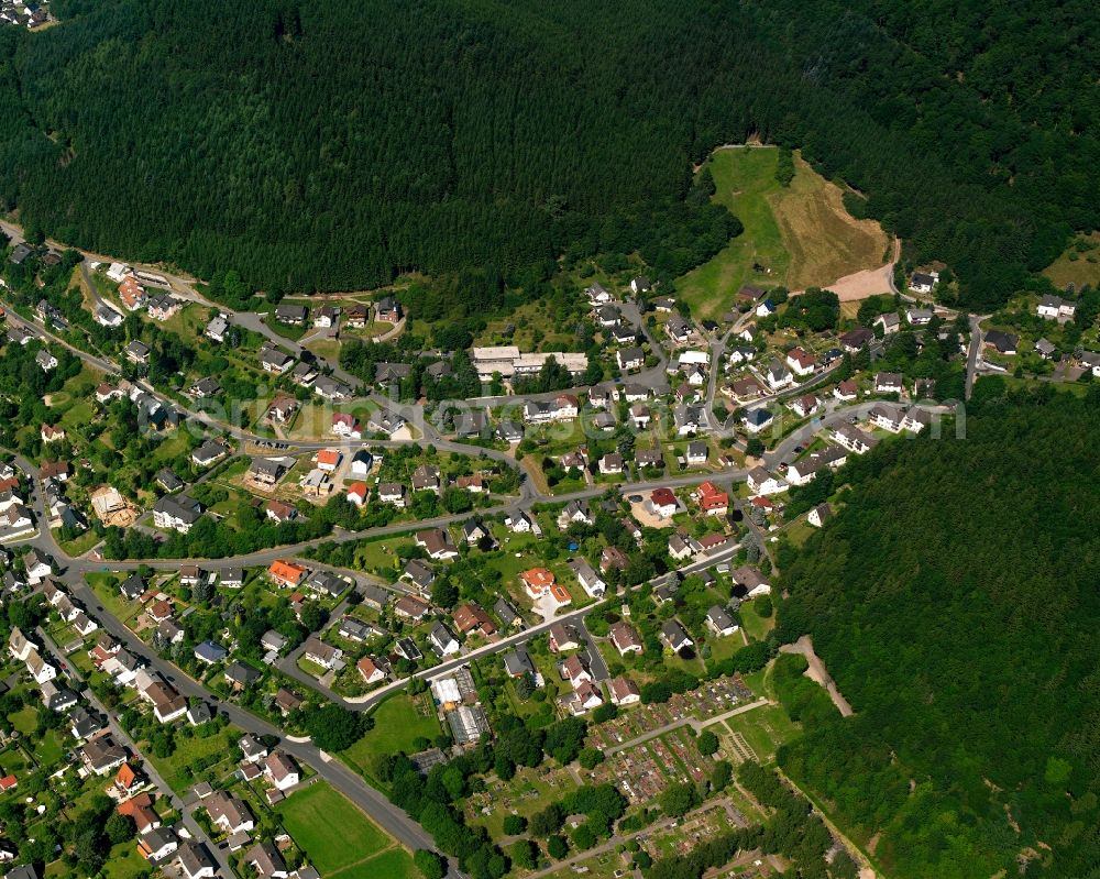 Banfe from the bird's eye view: Village - view on the edge of forested areas in Banfe at Siegerland in the state North Rhine-Westphalia, Germany