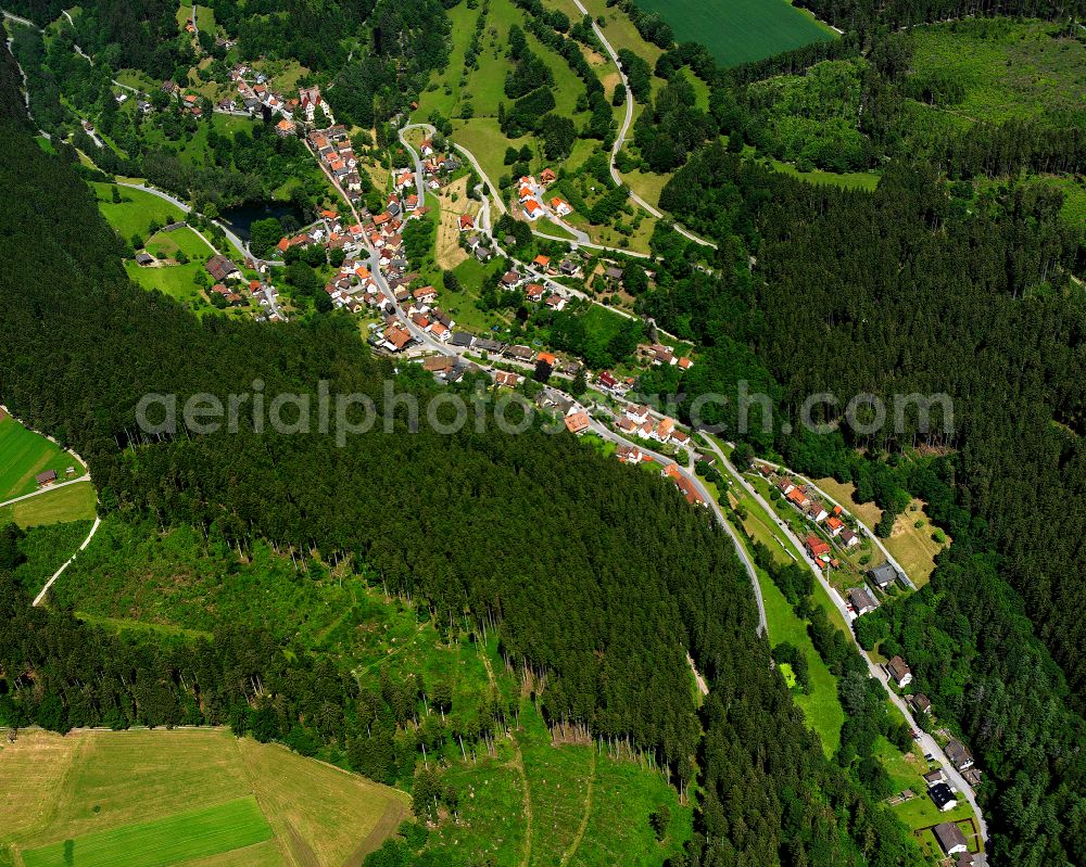 Berneck from the bird's eye view: Village - view on the edge of forested areas in Berneck in the state Baden-Wuerttemberg, Germany