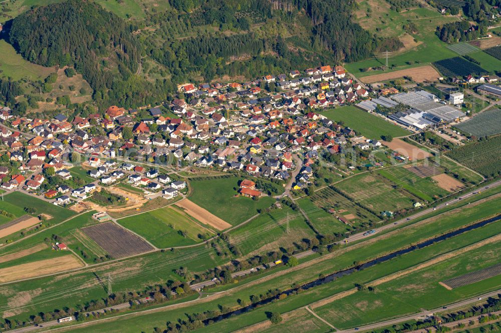 Bollenbach from the bird's eye view: Village - view on the edge of forested areas in Bollenbach in the state Baden-Wuerttemberg, Germany