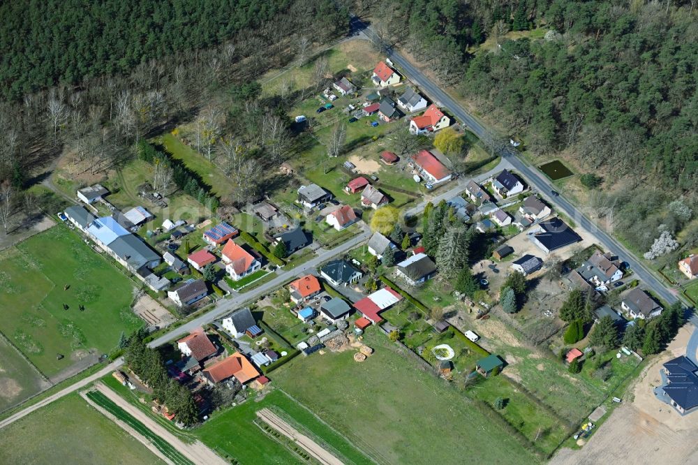 Boock from the bird's eye view: Village - view on the edge of forested areas in Boock in the state Mecklenburg - Western Pomerania, Germany