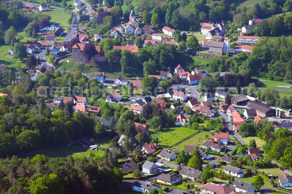 Buchenau from the bird's eye view: Village - view on the edge of forested areas in Buchenau in the state Hesse, Germany