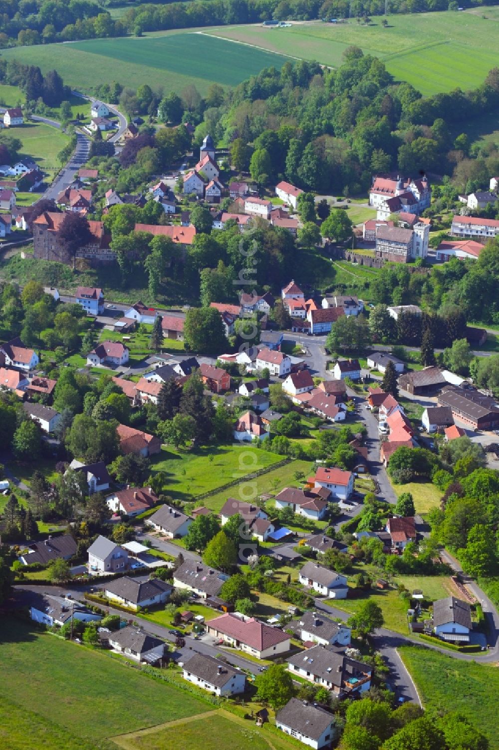 Aerial image Buchenau - Village - view on the edge of forested areas in Buchenau in the state Hesse, Germany