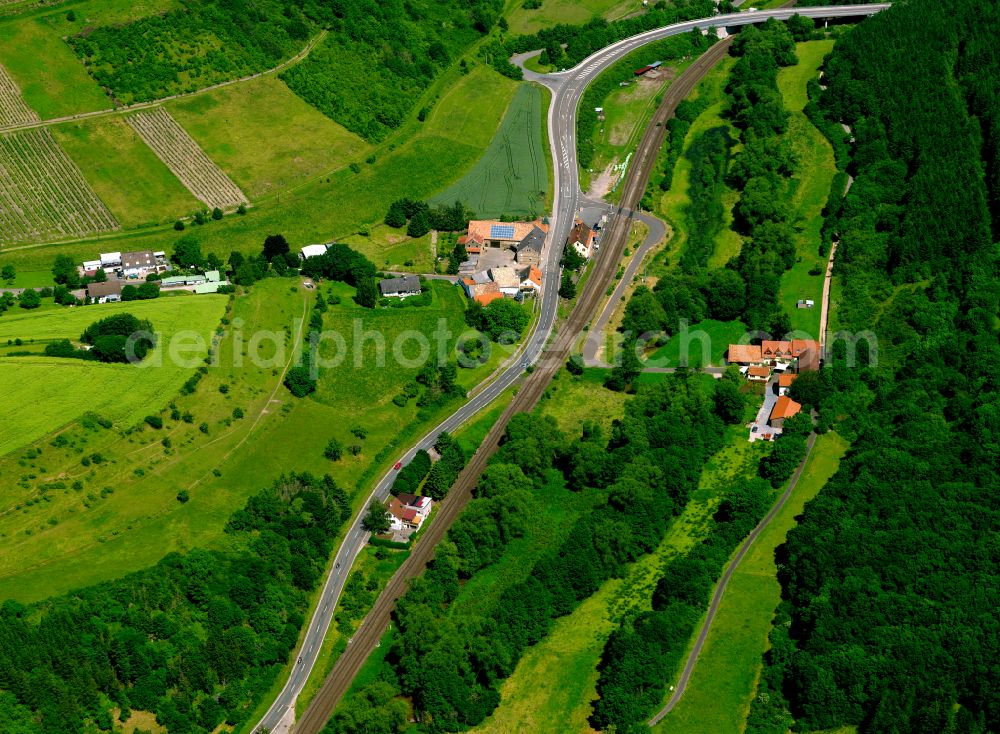 Cölln from the bird's eye view: Village - view on the edge of forested areas in Cölln in the state Rhineland-Palatinate, Germany