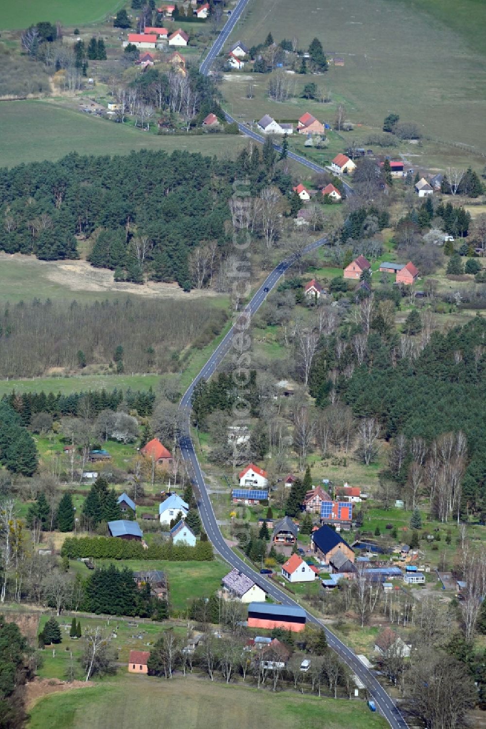 Gegensee from the bird's eye view: Village - view on the edge of forested areas in Gegensee in the state Mecklenburg - Western Pomerania, Germany