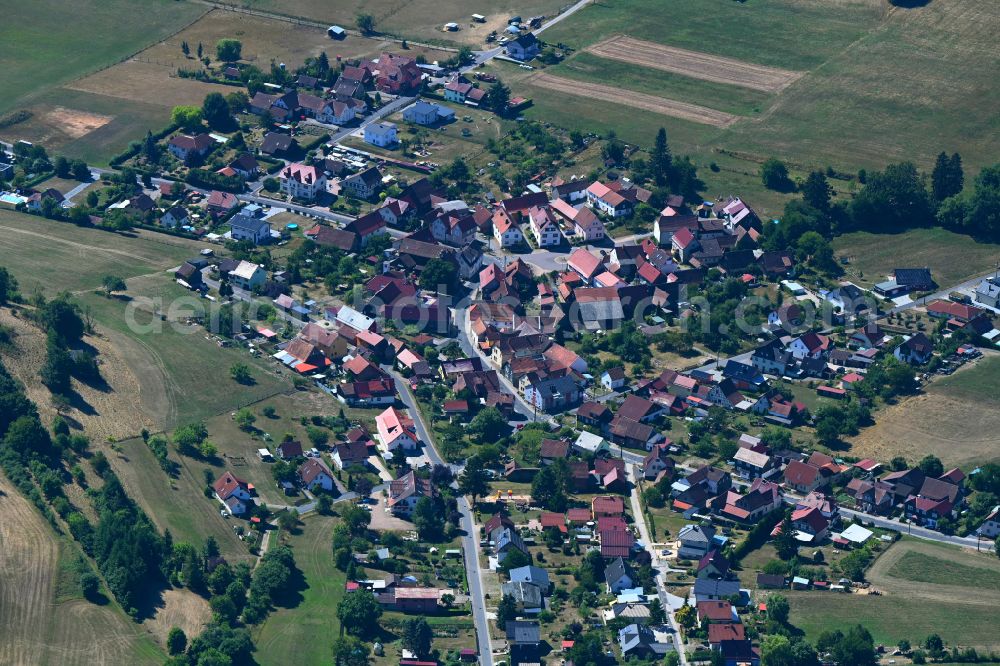 Gethles from above - Village - view on the edge of forested areas on street An der Hauptstrasse in Gethles in the state Thuringia, Germany