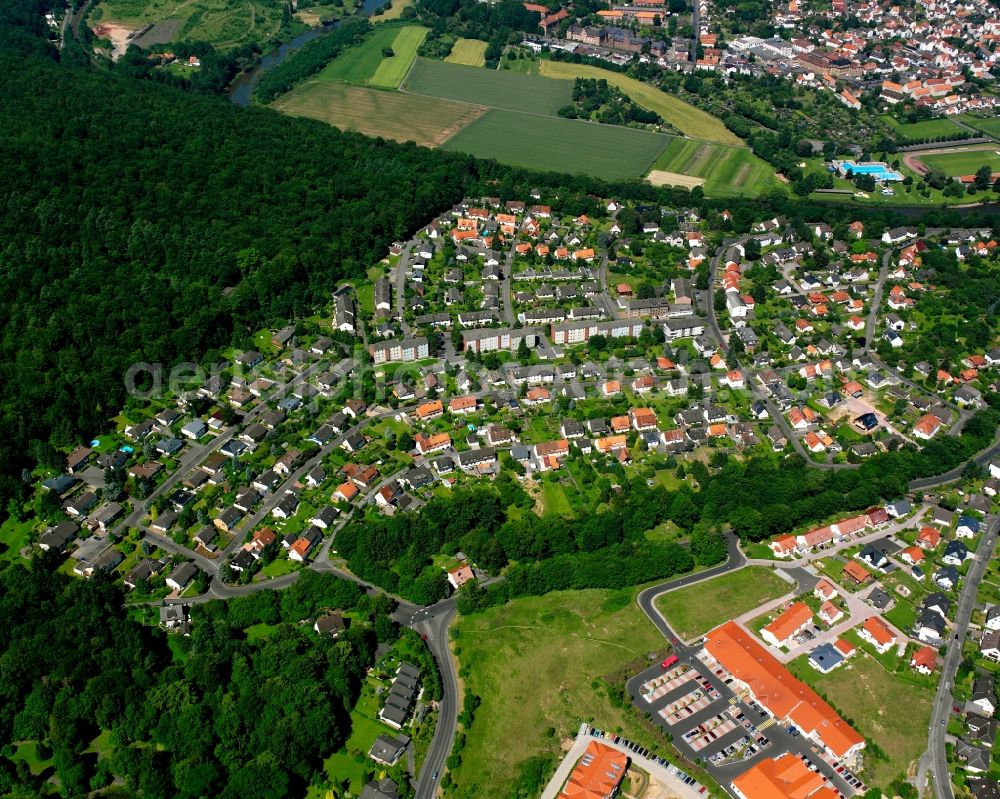 Hann. Münden from the bird's eye view: Village - view on the edge of forested areas in Hann. Muenden in the state Lower Saxony, Germany