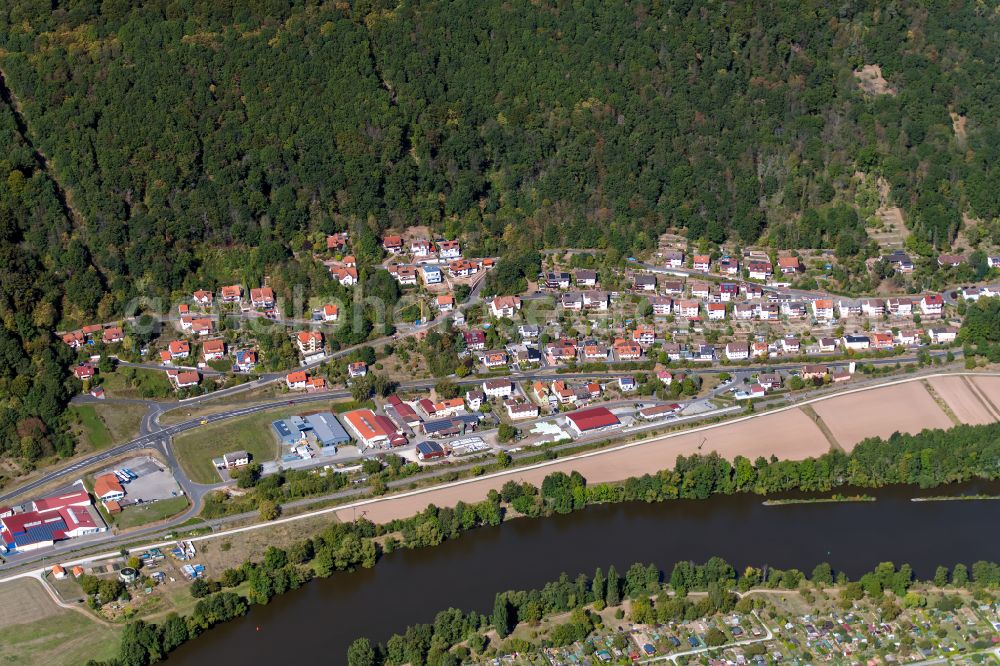 Hasloch from the bird's eye view: Village - view on the edge of forested areas in Hasloch in the state Bavaria, Germany