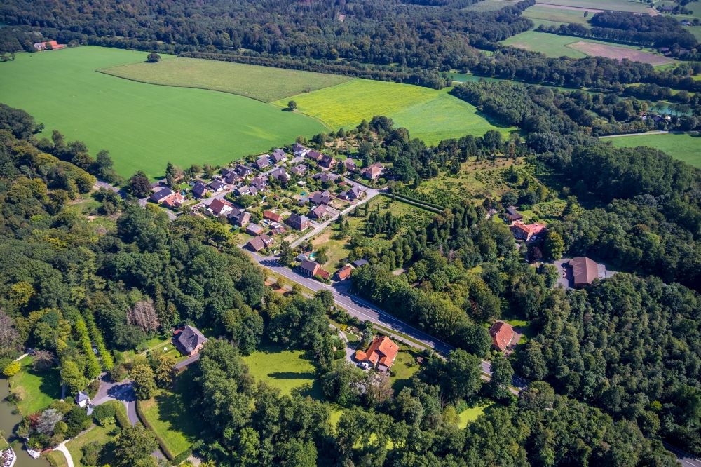 Aerial photograph Hünxe - Village - view on the edge of forested areas in Huenxe in the state North Rhine-Westphalia, Germany