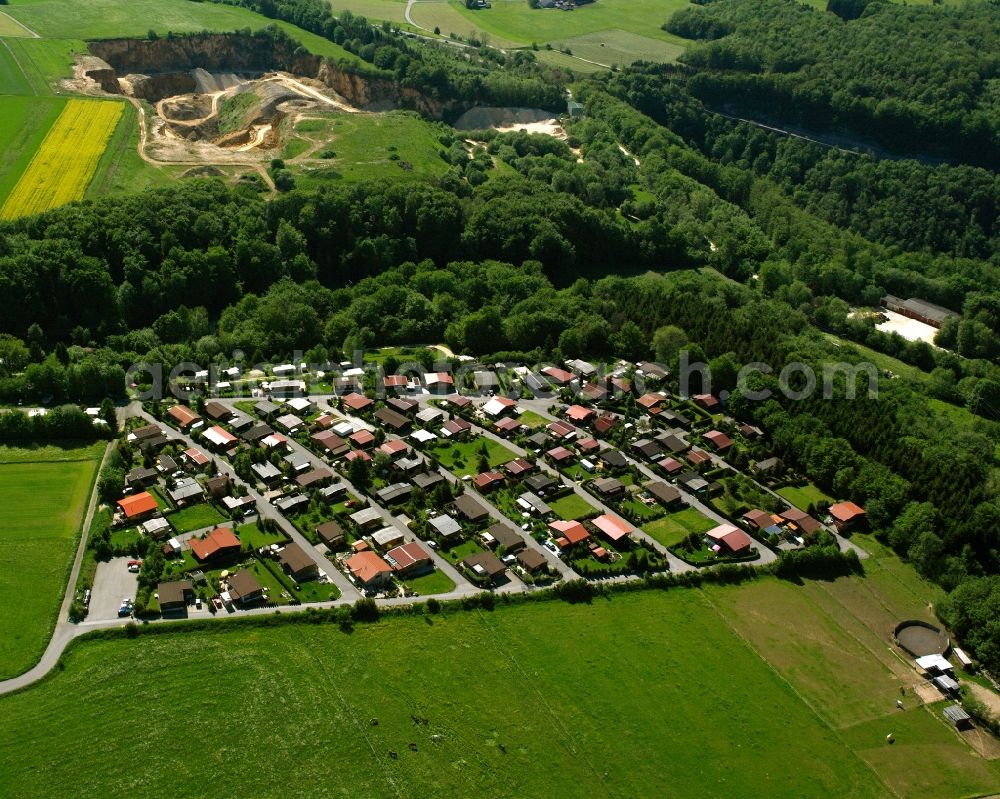 Hohenstadt from the bird's eye view: Village - view on the edge of forested areas in Hohenstadt in the state Baden-Wuerttemberg, Germany