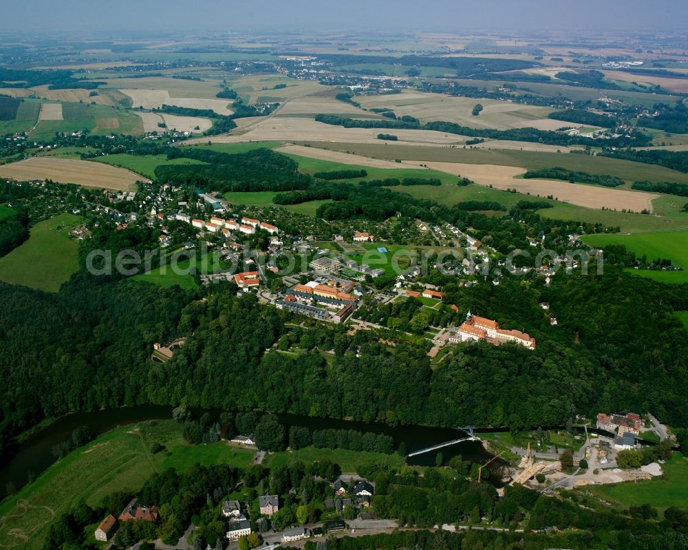 Lichtenwalde from the bird's eye view: Village - view on the edge of forested areas in Lichtenwalde in the state Saxony, Germany