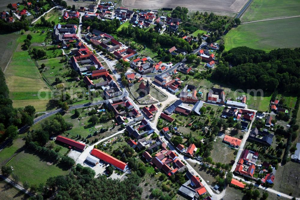 Nichel from the bird's eye view: Village - view on the edge of forested areas in Nichel in the state Brandenburg, Germany