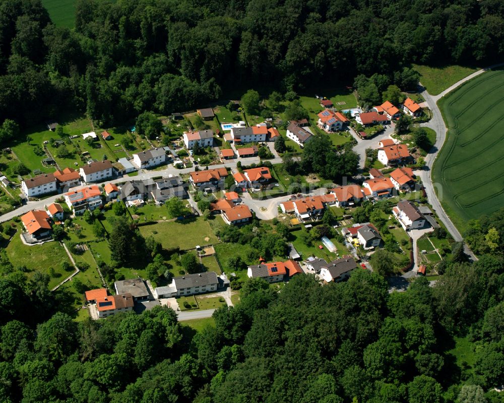 Oberschroffen from the bird's eye view: Village - view on the edge of forested areas in Oberschroffen in the state Bavaria, Germany