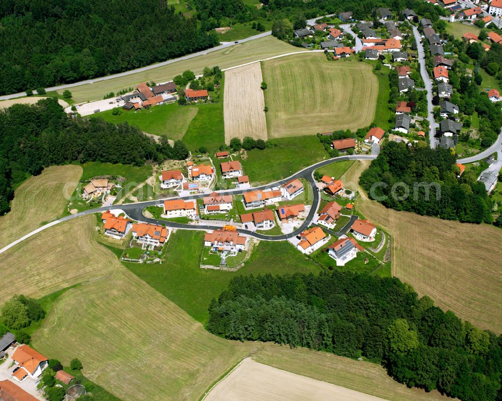 Aerial image Reischach - Village - view on the edge of forested areas in Reischach in the state Bavaria, Germany